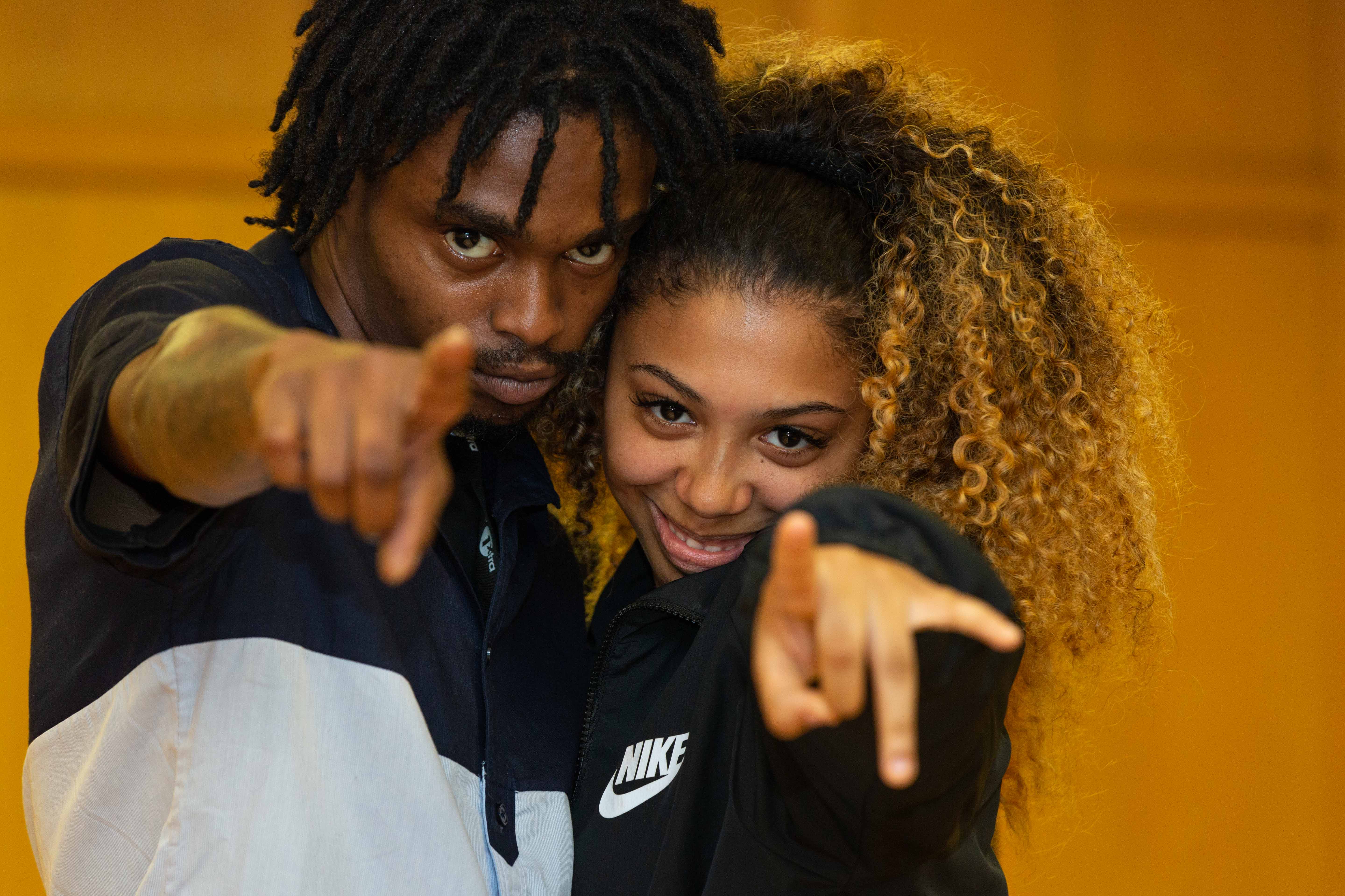 Two young people performing with Intermission Youth