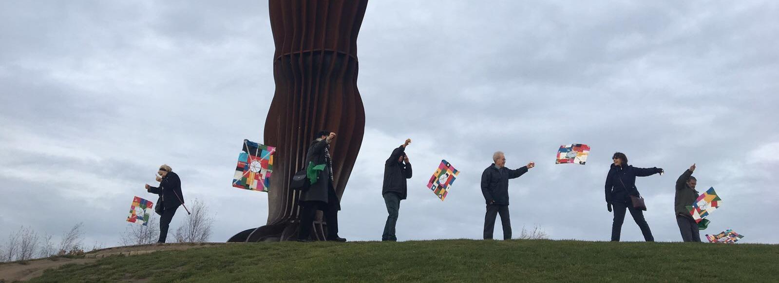 Equal Arts Carers’ Cultural Adventures’ Group flying their handmade Korean flags Photographer Dani Giddins