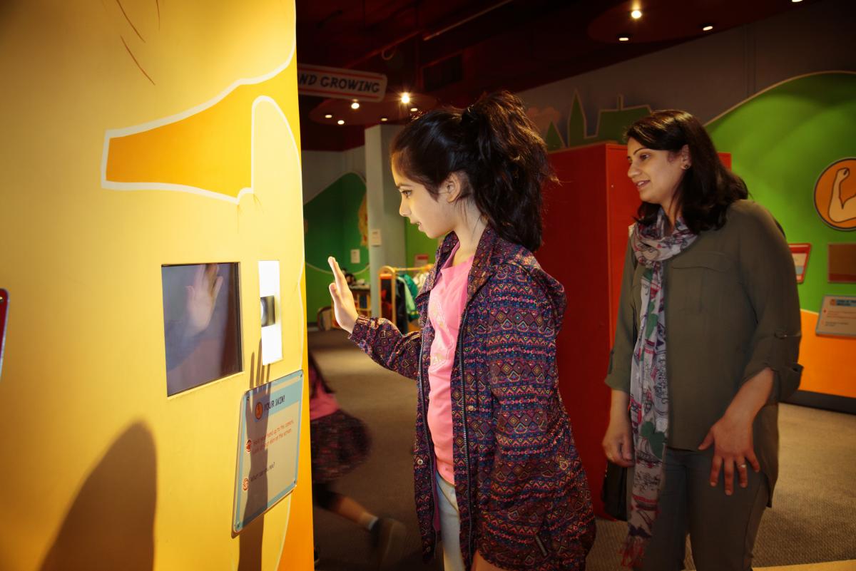 A woman and young girl look at a display in the Life Zone Gallery at Thackray Medical Museum, Leeds