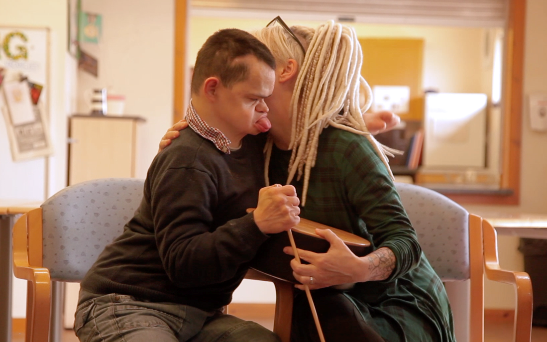 An embrace during a music session at The Montrose Centre