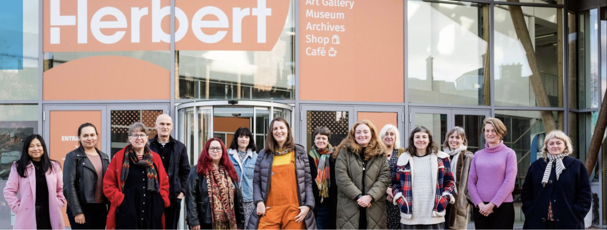 A group of women standing in front of Herbert Art Gallery and Museum