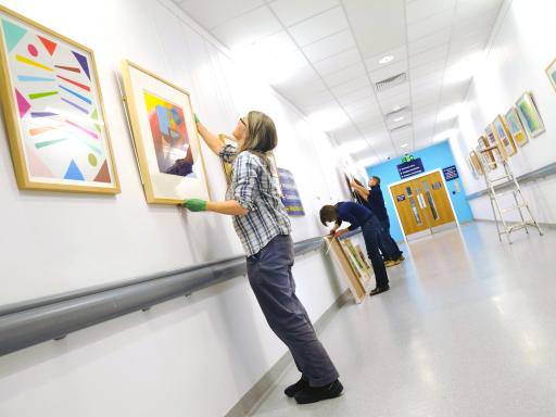 The Paintings in Hospitals team at work at Queen Elizabeth Hospital Birmingham