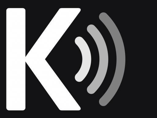A large white K on a black background with signal symbol