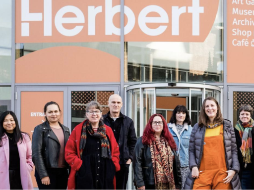 A group of women standing in front of Herbert Art Gallery and Museum